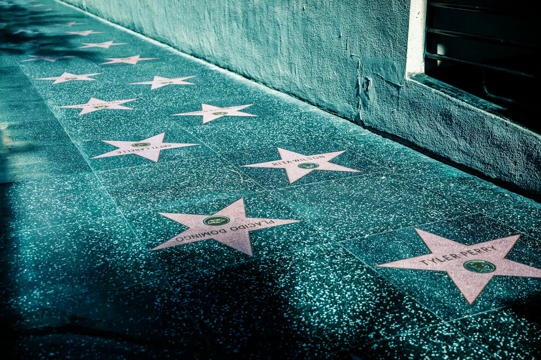 View of Hollywood Walk of Fame with stars on the sidewalk in Los Angeles, California.