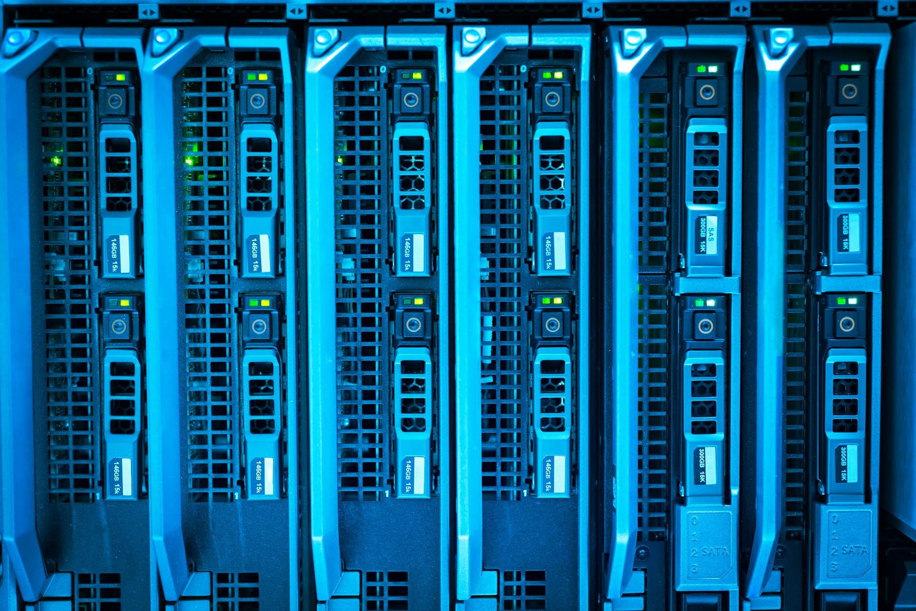 Data Center Nation Milano — Detailed image of illuminated server racks showcasing modern technology infrastructure.