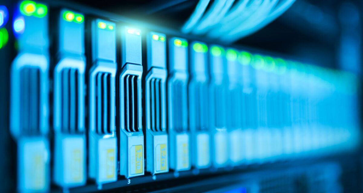 Detailed image of a server rack with glowing lights in a modern data center.