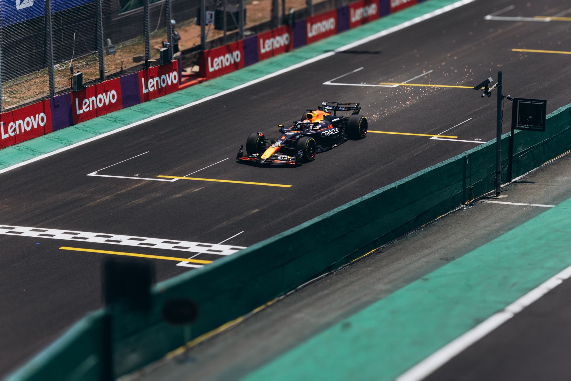 pole position Madrid — A Formula 1 car speeds down the track during a race, showcasing high performance.