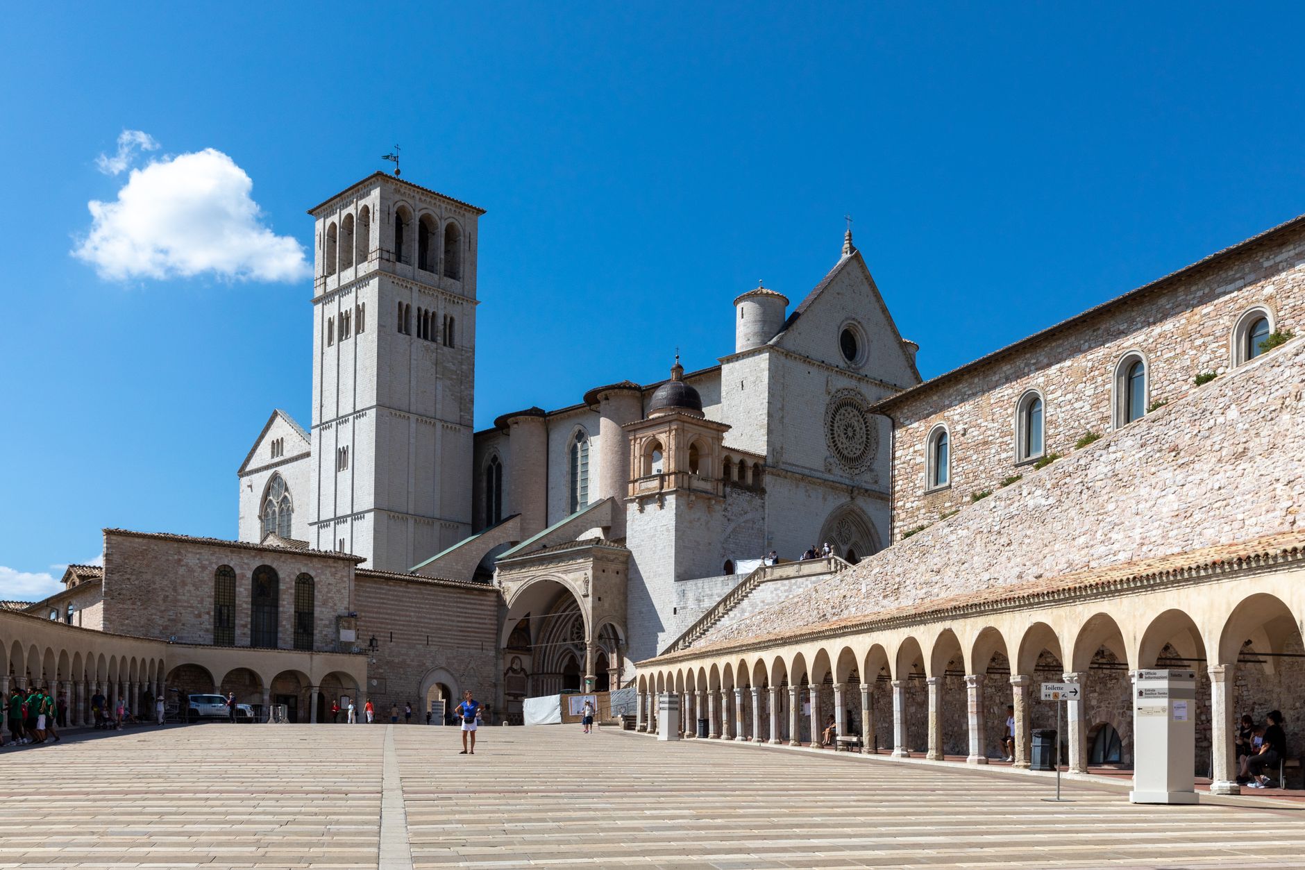 Stunning view of the Basilica of St. Francis in Assisi, Italy, showcasing its Romanesque architecture.